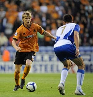 Images Dated 18th August 2009: Wolverhampton Wanderers vs Wigan Athletic: A Battle of Stars - Andy Keogh vs Jason Koumas (BPL)