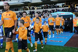Framed Print : Wolverhampton Wanderers vs Wigan Athletic: A Mascot Showdown - Premier League Battle Framed Print : Wolverhampton Wanderers vs Wigan Athletic: A Mascot Showdown - Premier League Battle
