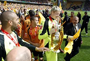 2009 Prints: Wolverhampton Wanderers: Wayne Hennessey's Triumphant Moment with the Championship Trophy (2008-09)