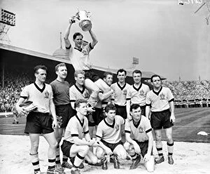 Images Dated 7th May 1960: Wolves FA Cup Victory: Bill Slater Celebrates with Teammates