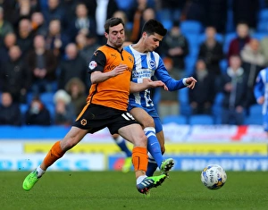 Sky Bet Championship - Brighton And Hove Albion V Wolves - AMEX Stadium Prints: Wolves Jack Price Faces Off Against Joao Carlos in Sky Bet Championship Clash at Brighton's AMEX Stadium