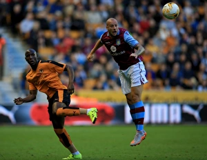 Pre-Season Friendly Prints: Wolves vs Aston Villa: Pre-Season Clash at Molineux - Hutton vs Afobe Heading Battle
