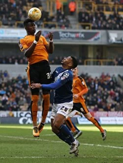 Images Dated 13th March 2016: Wolves vs Birmingham City: Intense Battle for the Ball between Kortney Hause and David Davis