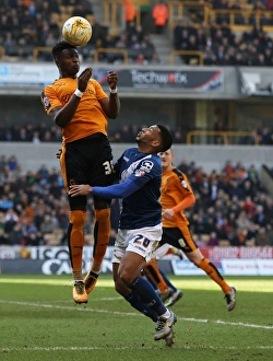 Wolves vs Birmingham City: Intense Battle for the Ball between Kortney Hause and David Davis