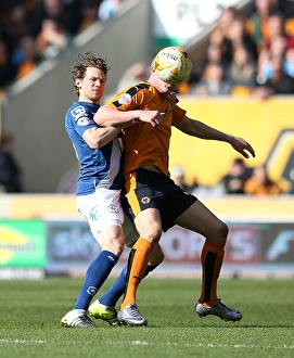 Sky Bet Championship Prints: Wolves vs Birmingham City: Intense Battle Between Bjorn Sigurdarson and Jonathan Spector