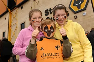 Wolves V Bolton Prints: Wolves vs. Bolton Wanderers: A Premier League Mascot Showdown