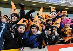 Images Dated 20th December 2009: Wolves vs Burnley Mascot Showdown: A Premier League Face-Off