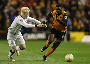 Sky Bet Championship - Wolves V Derby County - Molineux Stadium Prints: Wolves vs Derby County: Intense Battle Between Bakary Sako and Will Hughes in Sky Bet Championship Match