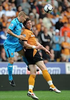 Premiership Collection: Wolves vs Hull City: A Fierce Encounter Between Greg Halford and Andy Dawson