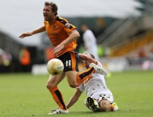 Images Dated 16th August 2015: Wolves vs Hull City Showdown: A Championship Battle between McDonald and Meyler at Molineux