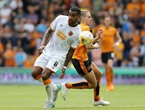 Sky Bet Championship - Wolves v Hull City - Molineux Collection: Wolves vs Hull City Showdown: Edwards vs Huddlestone Battle at Molineux (Sky Bet Championship)
