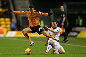 Sky Bet Championship - Wolves V Leeds United - Molineux Stadium Prints: Wolves vs. Leeds United: Intense Battle for Supremacy in Sky Bet Championship - Cook vs