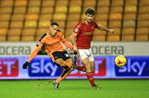 Framed Print : Wolves vs. Nottingham Forest: Jordan Graham and Eric Lichaj Clash in Sky Bet Championship Match at Molineux