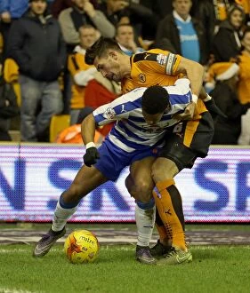 Wolves v Reading - Sky Bet Championship - Molineux Collection: Wolves vs Reading: Intense Battle Between Danny Batth and Garath McCleary in the Sky Bet