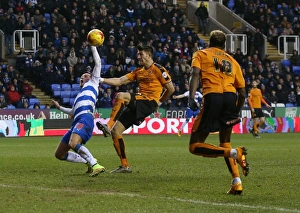 Sky Bet Championship Prints: Wolves vs. Reading: Intense Moment between Rakels and Batth in Sky Bet Championship