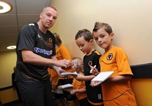 Images Dated 7th August 2011: Wolves vs. Real Zaragoza: A Tunnel Showdown - Clash of the Matchday Mascots